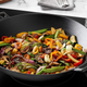 AmazonBasics Pre-Seasoned Cast Iron Wok Pan | $27 | Amazon